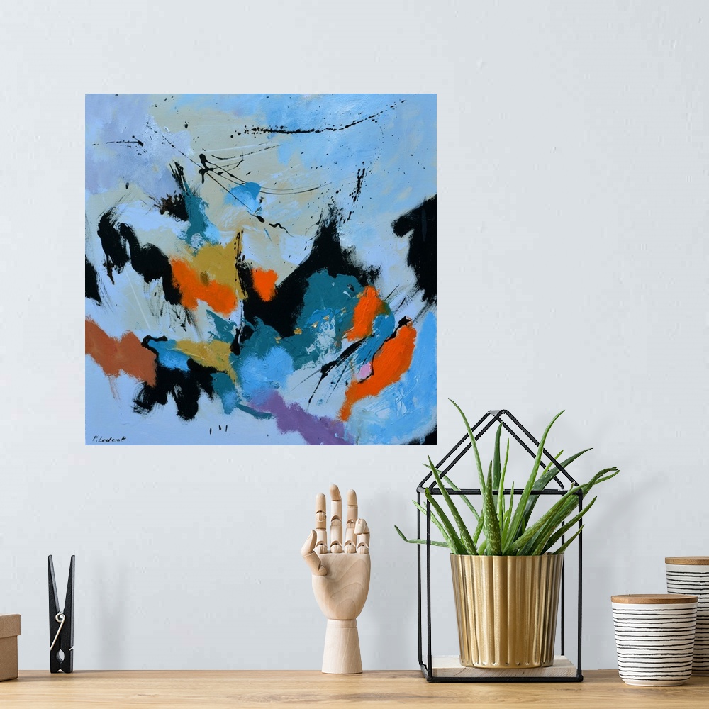 A bohemian room featuring A square abstract painting in muted shades of black, blue,orange and purple with splatters of pai...