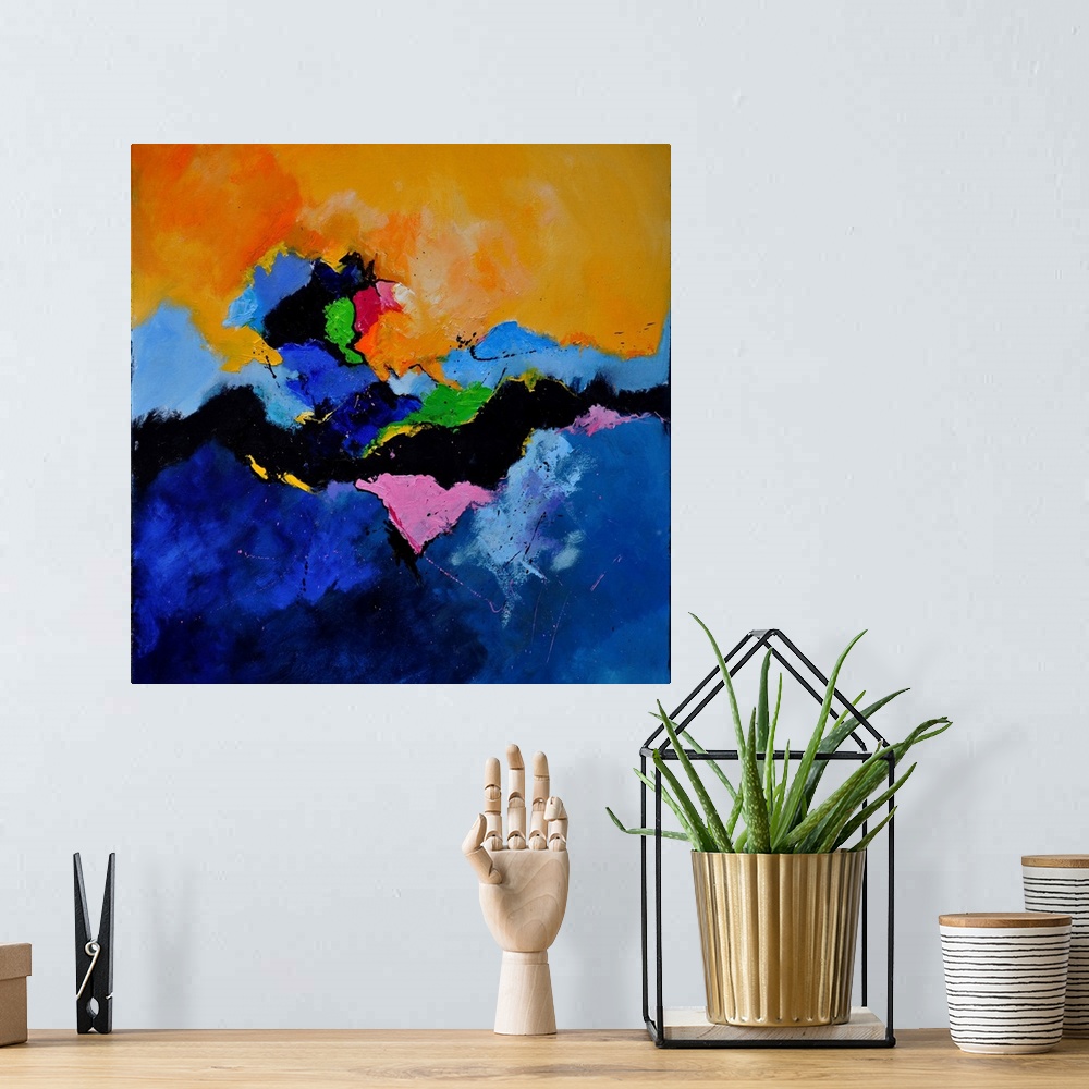 A bohemian room featuring Abstract square painting in shades of orange, blue, pink and green mixed in with black contrastin...