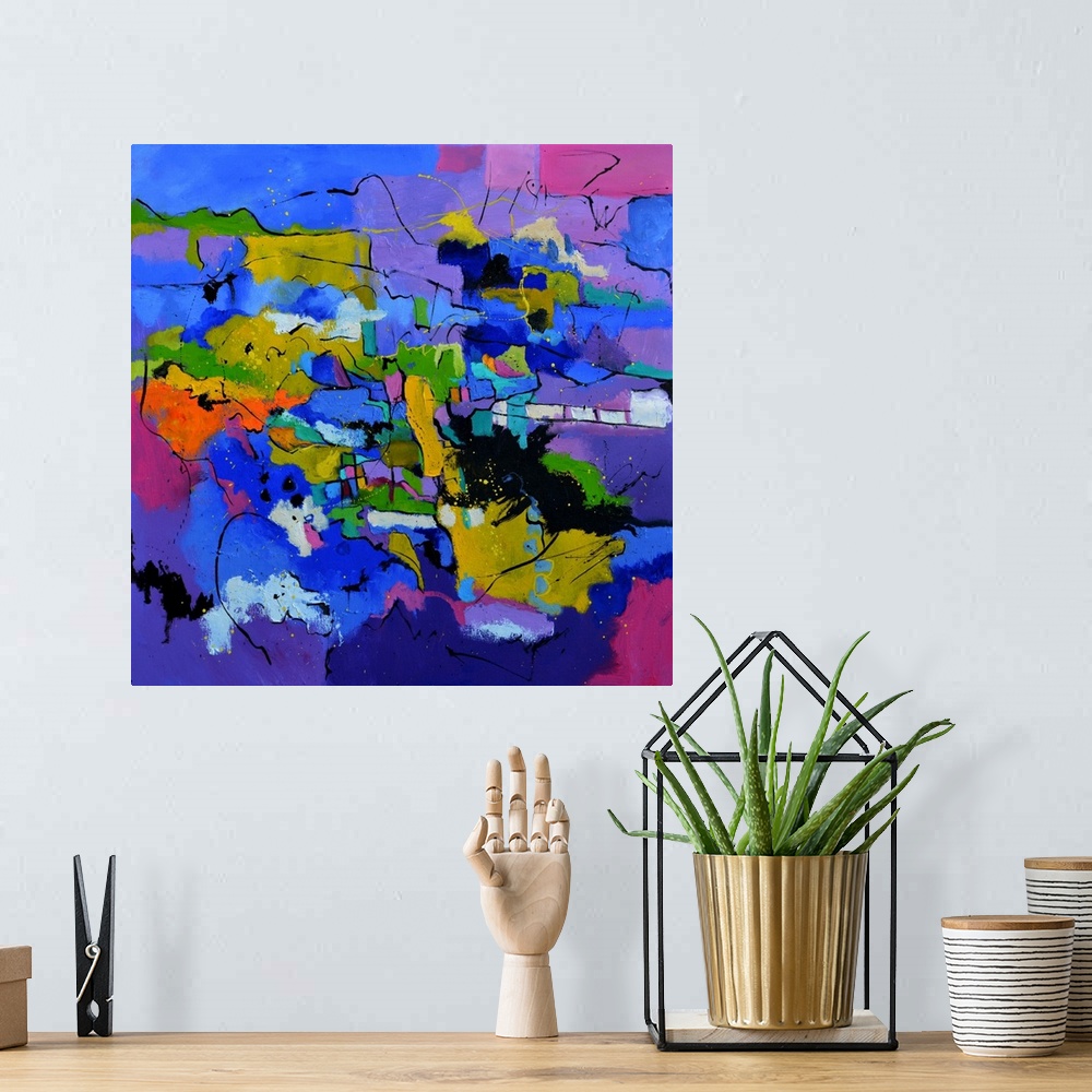 A bohemian room featuring A square abstract painting in dark shades of purple, blue, white and yellow with splatters of pai...
