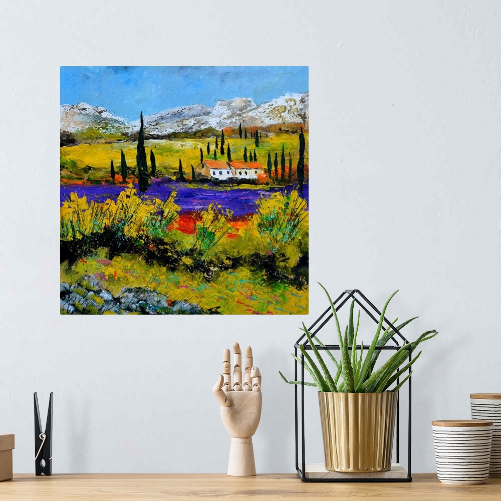 A bohemian room featuring Vibrant painting of a bright Summer day with a house next to a river and mountains in the distance.