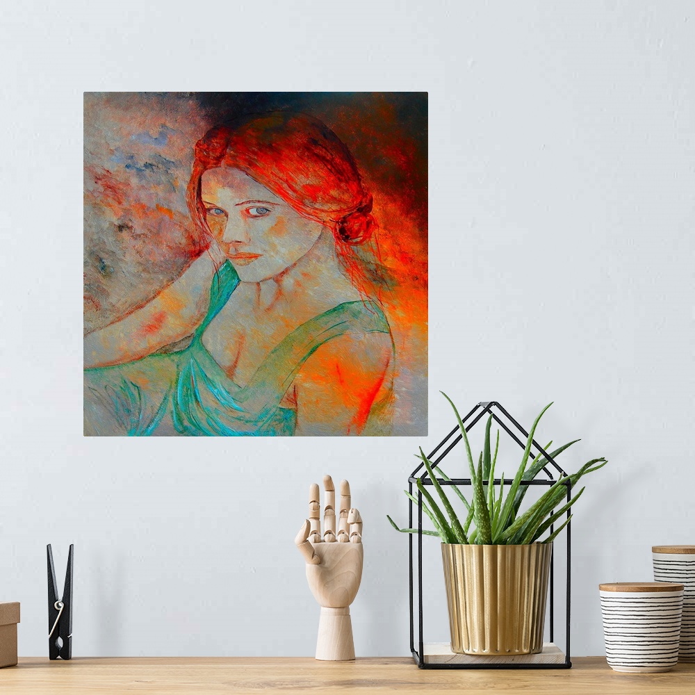 A bohemian room featuring A vibrant contemporary painting of a female with red hair.