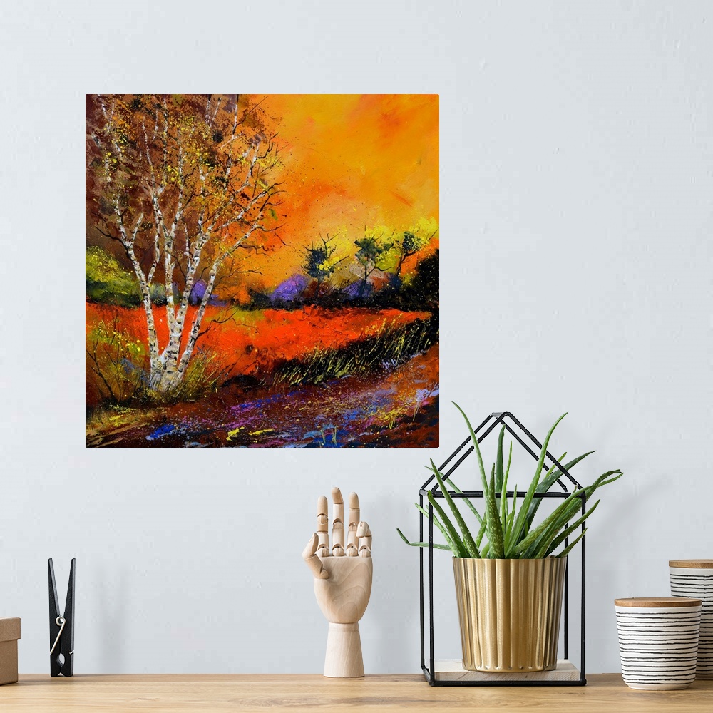 A bohemian room featuring Square painting of an Autumn landscape with orange and yellow flowers in the foreground and a bri...