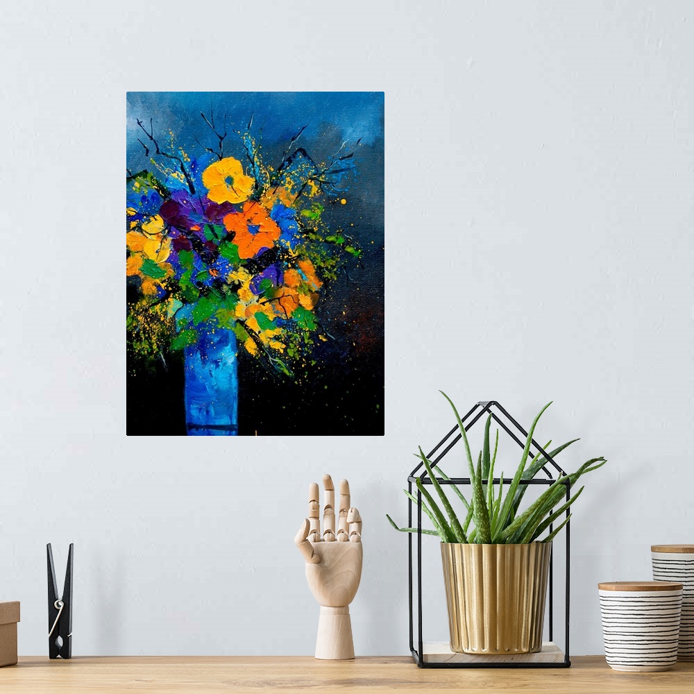 A bohemian room featuring Vertical painting of a vase of flowers against a blue tone background.