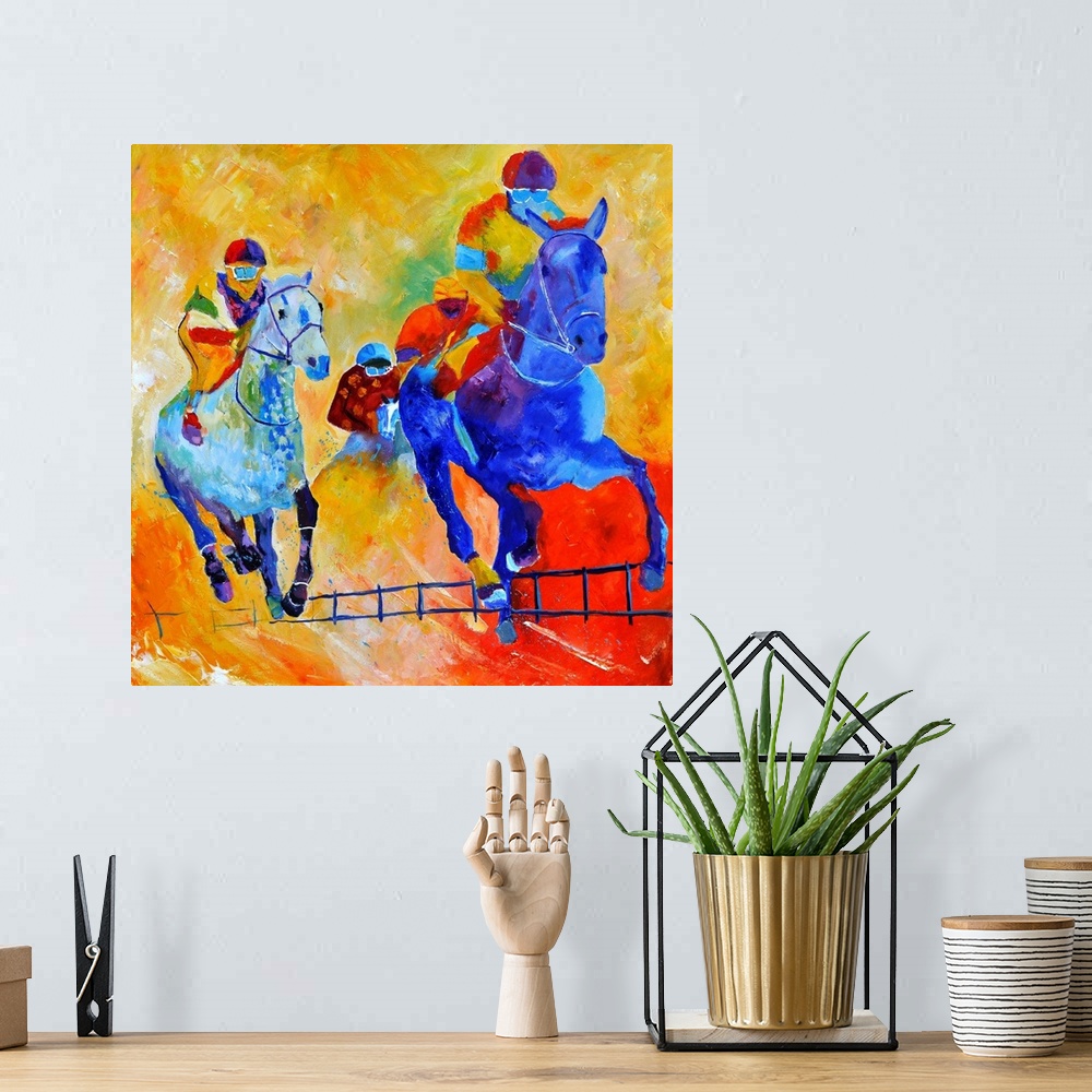 A bohemian room featuring Square complementary painting of horse racing in bright textured tones of blue, yellow and red.