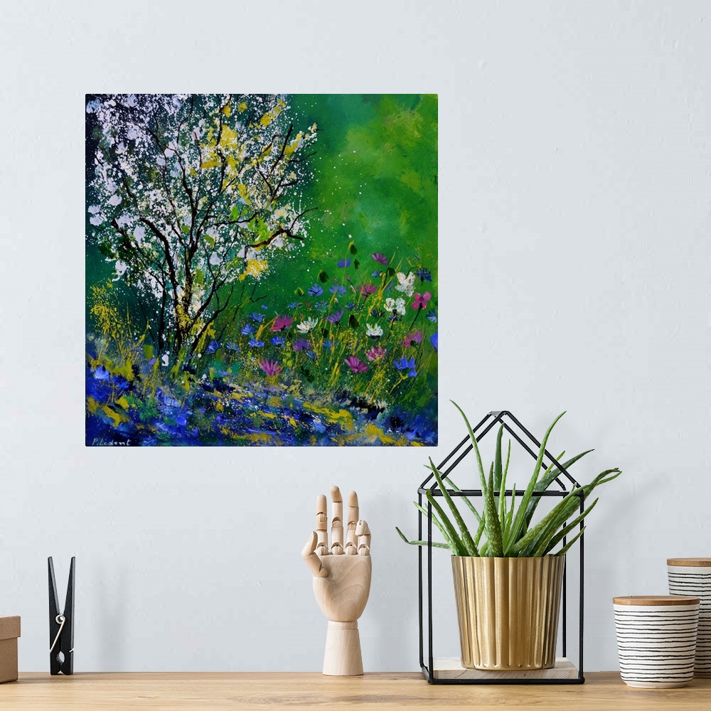 A bohemian room featuring Square painting of colorful Spring wildflowers and a tree with white blossoms in an abstract style.