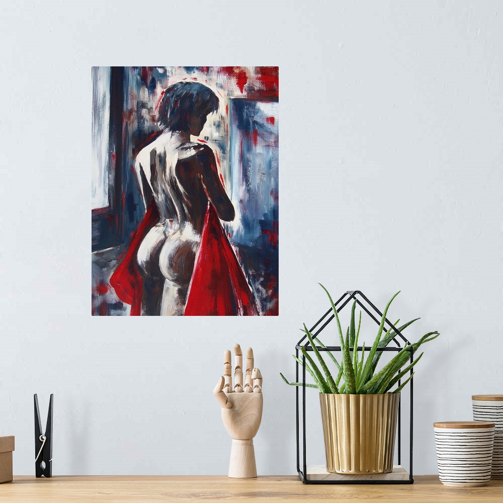 A bohemian room featuring A nude painting of the back of a woman holding a red cloth to her front.