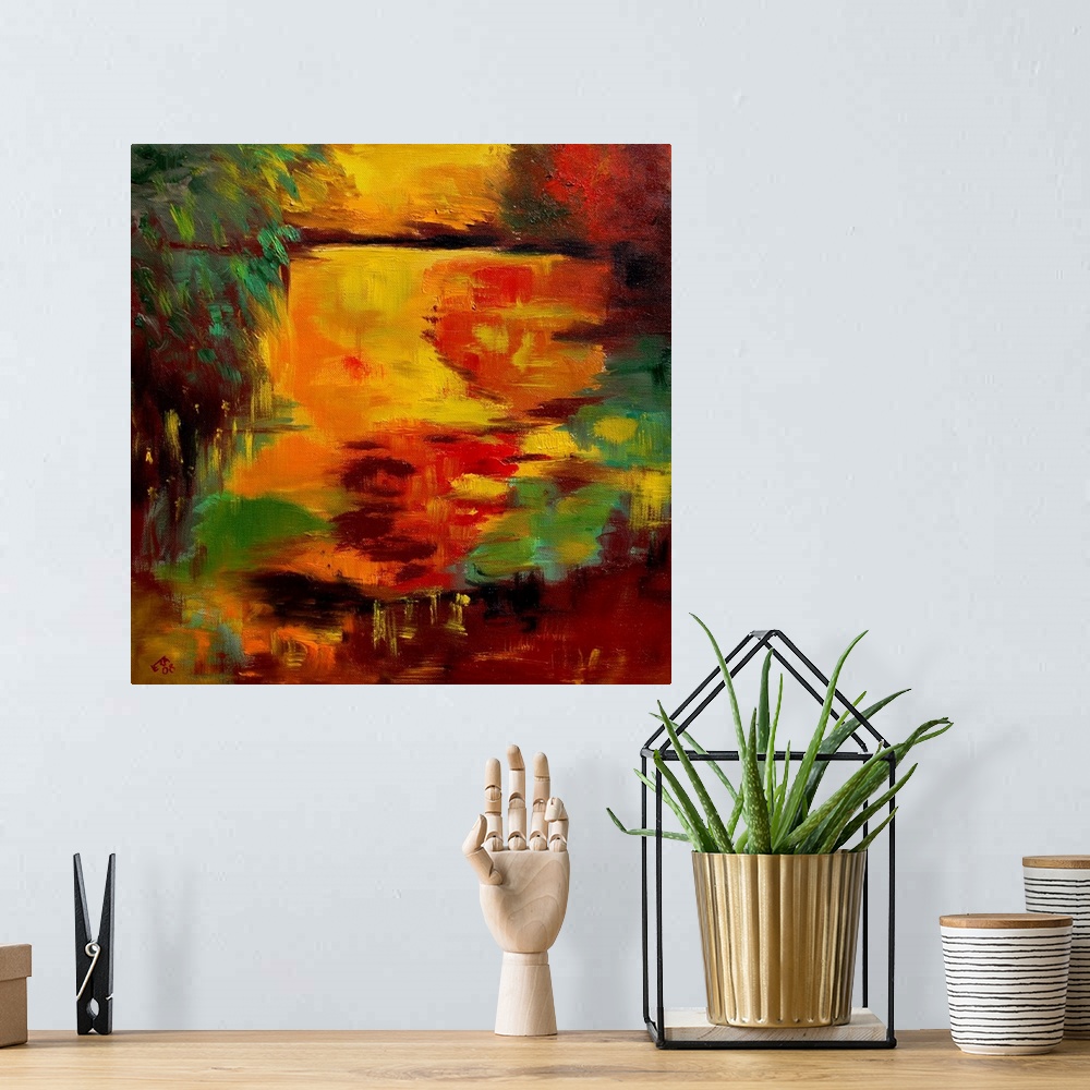 A bohemian room featuring A square abstract landscape of a pond with vivid colors of yellow and orange.