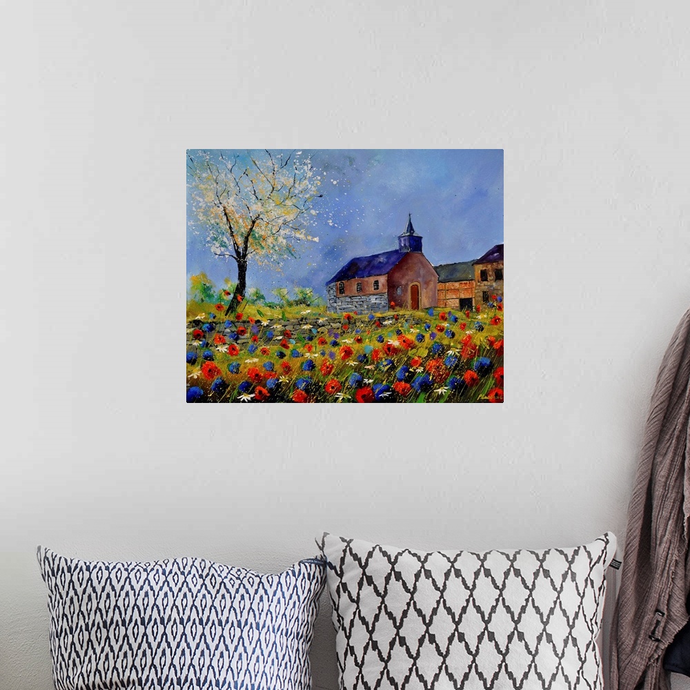 A bohemian room featuring Vibrant colored springtime scene of a church surround by blooming flowers and trees with a blue sky.