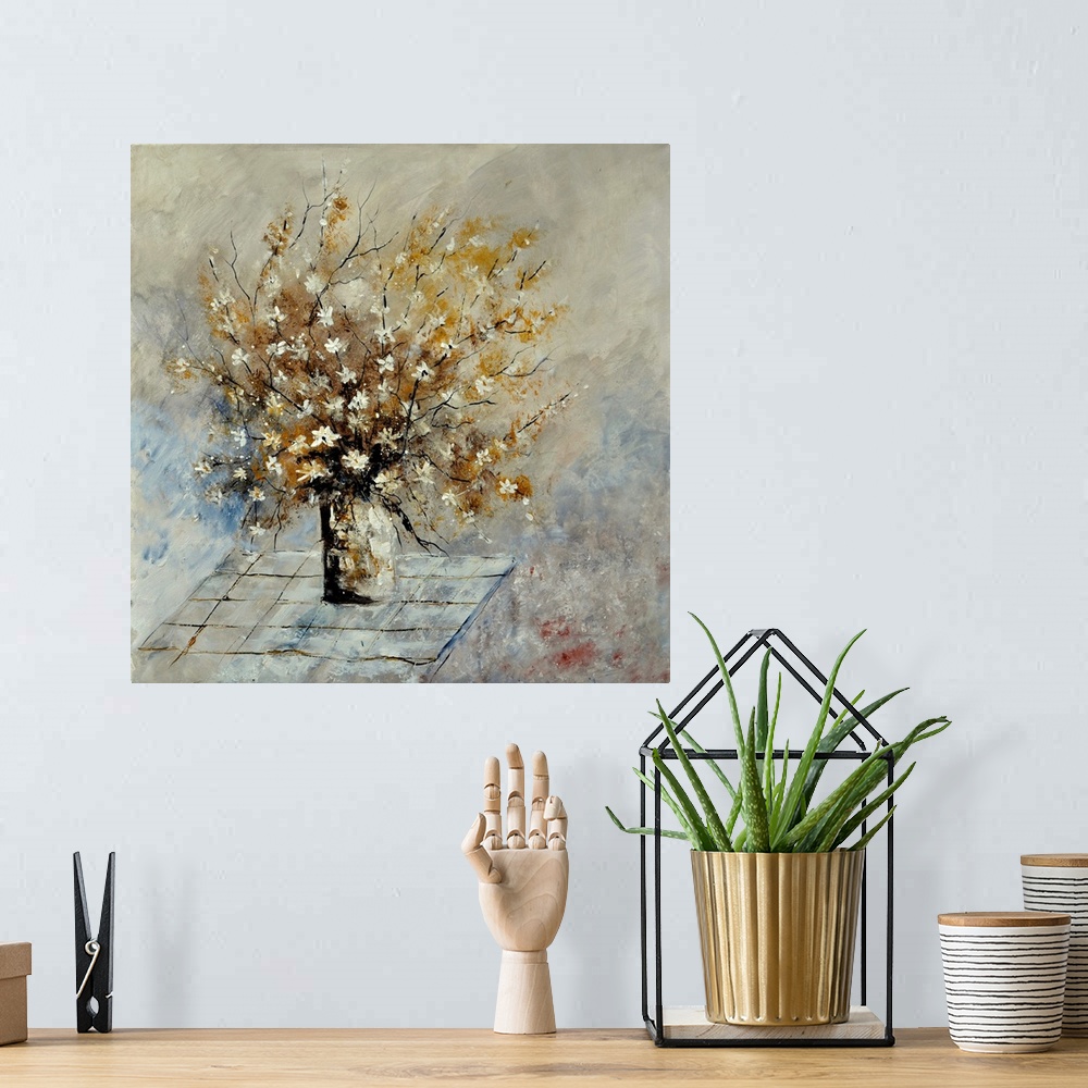 A bohemian room featuring Contemporary painting of a vase of small white flowers on a table against a neutral backdrop.