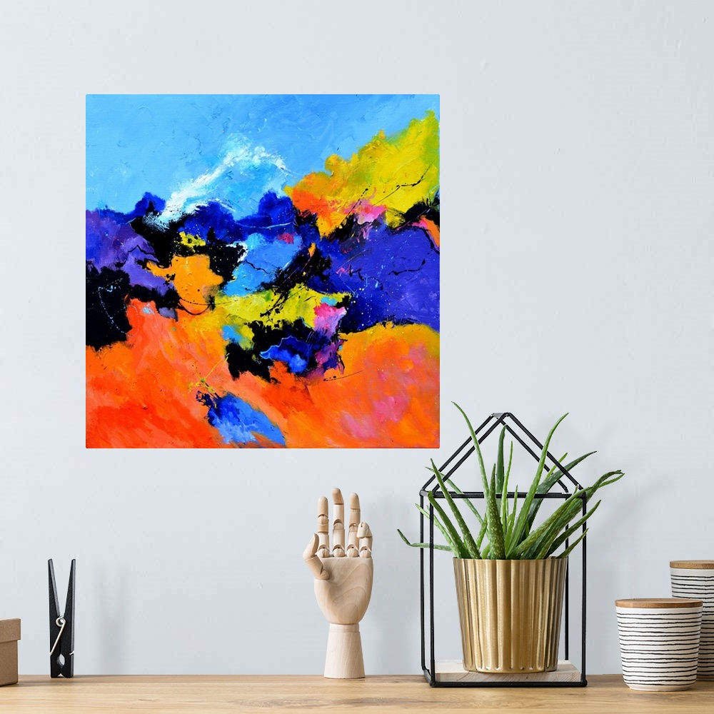 A bohemian room featuring Abstract painting with vibrant hues in shades of orange, yellow, blue, pink, purple, and white mi...