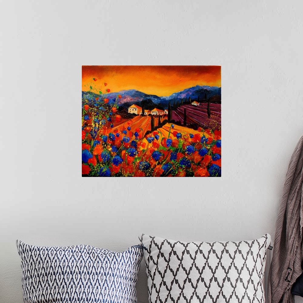 A bohemian room featuring Square painting of a vibrant landscape with red and blue poppies in the foreground and a bright w...