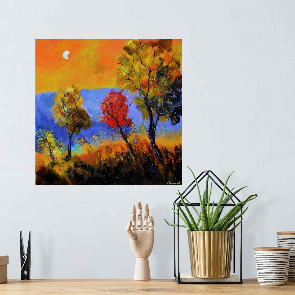 A bohemian room featuring Square painting with Autumn trees with a purple and orange background and a bright moon in the sky.