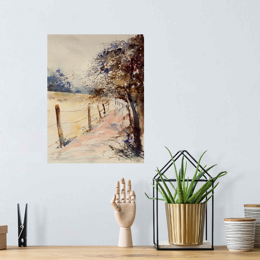 A bohemian room featuring A vertical watercolor painting of a fenced in field lined bya road and trees in the countryside i...
