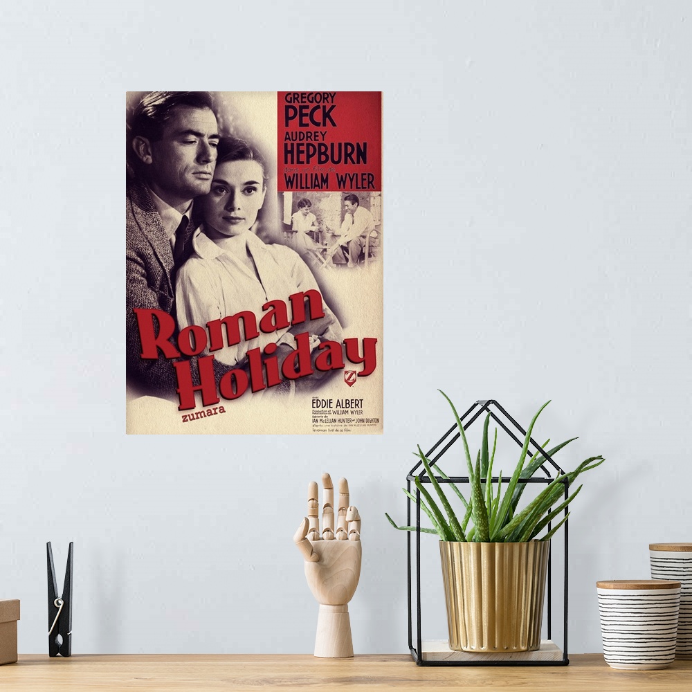 A bohemian room featuring Audrey Hepburn Roman Holiday Poster 3