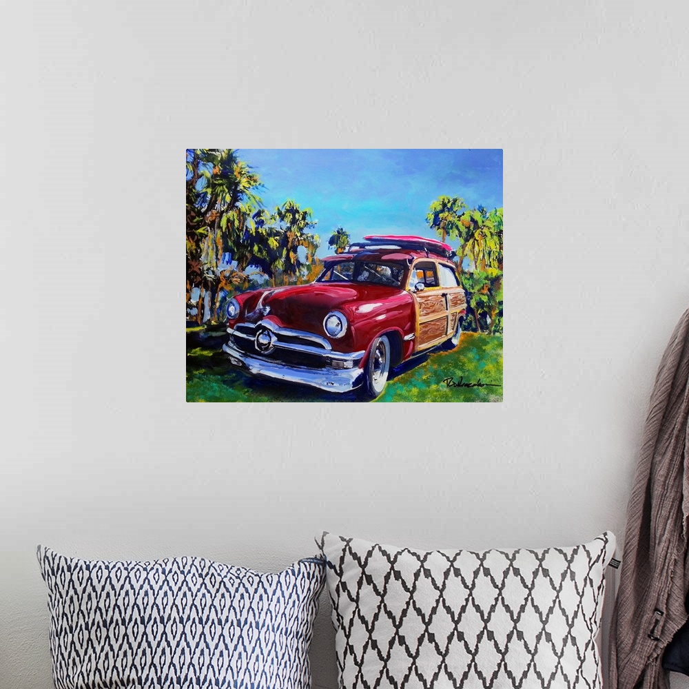 A bohemian room featuring The classic California Woodie car, painting by Rd Riccoboni.