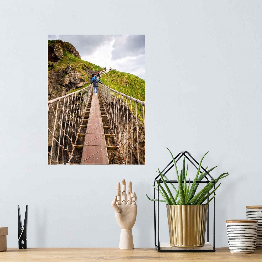 A bohemian room featuring Photograph with people walking across the County Antrim, Northern Ireland near the Giant's Causew...