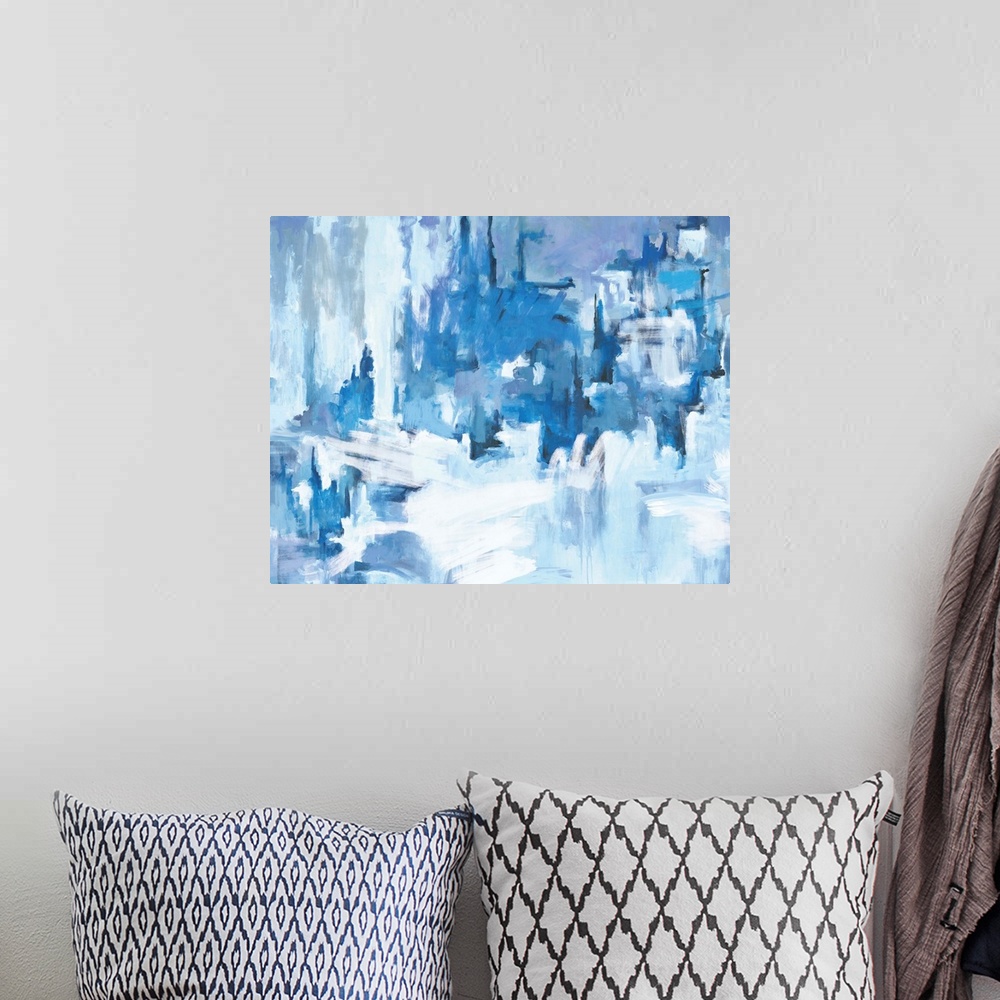 A bohemian room featuring A contemporary abstract painting using multiple tones of blue creating a sort of icy landscape.