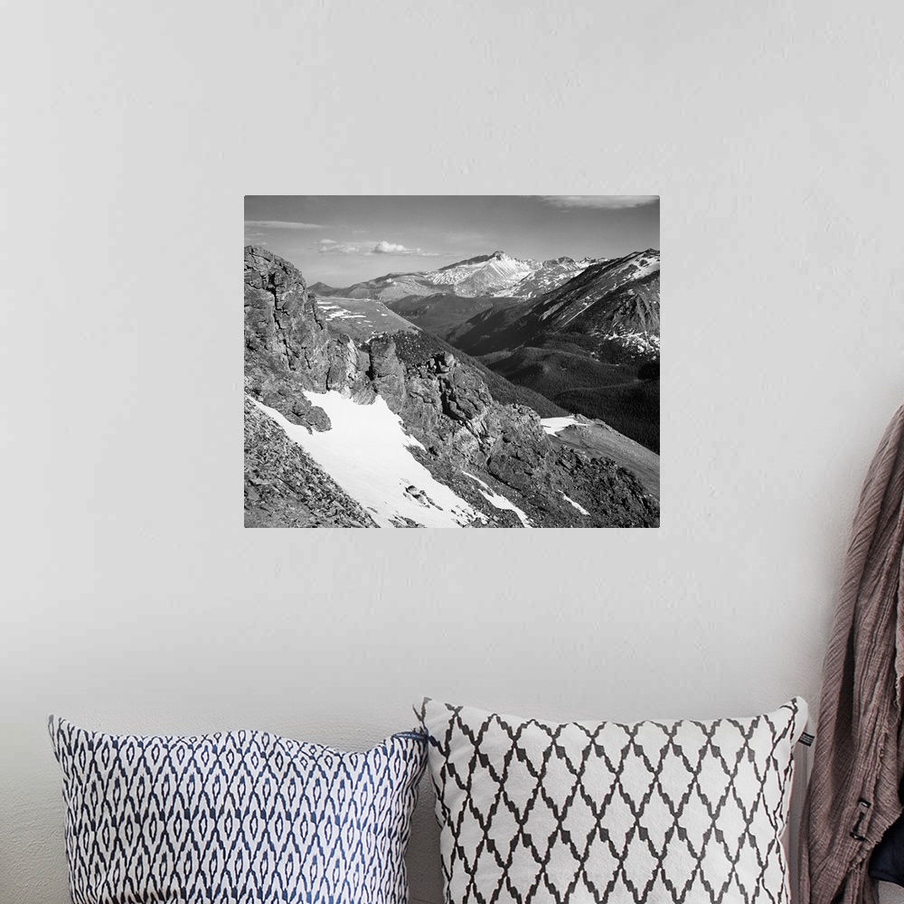 A bohemian room featuring Long's Peak, Rocky Mountain National Park, panorama of barren mountains with snow.