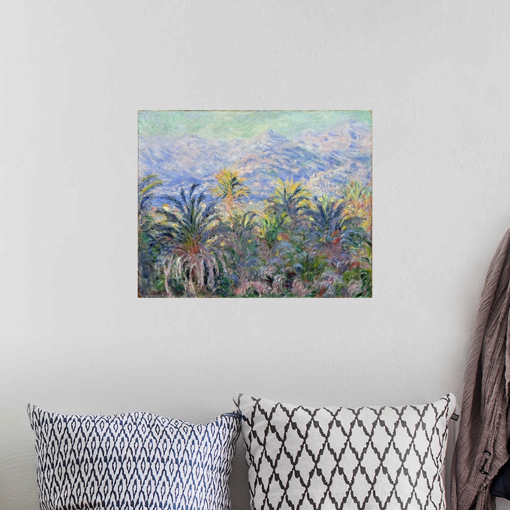 A bohemian room featuring This canvas, like?The Valley of the Nervia, was painted during Monet's trip to the Italian Rivier...