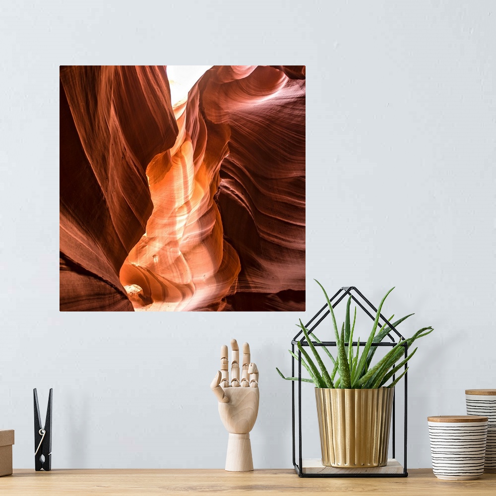A bohemian room featuring Square photograph inside of Antelope Canyon rock formation located on the Navajo Reservation in P...