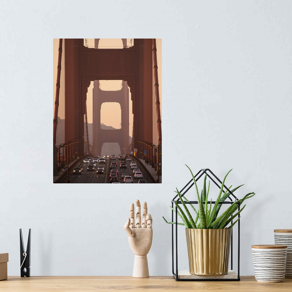 A bohemian room featuring Sunset photograph of traffic on the Golden Gate Bridge in San Francisco.