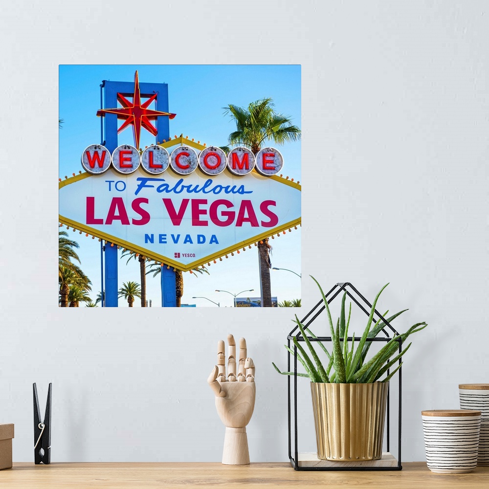 A bohemian room featuring Square photograph of the Welcome to Fabulous Las Vegas Nevada sign.