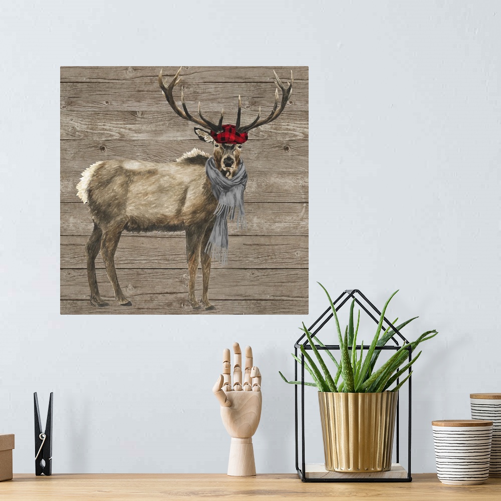 A bohemian room featuring Decorative image of a buck wearing a plaid cap and gray scarf against a wood panel backdrop.