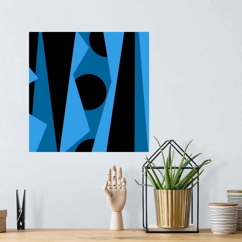 A bohemian room featuring Geometric abstract design in blue and black.