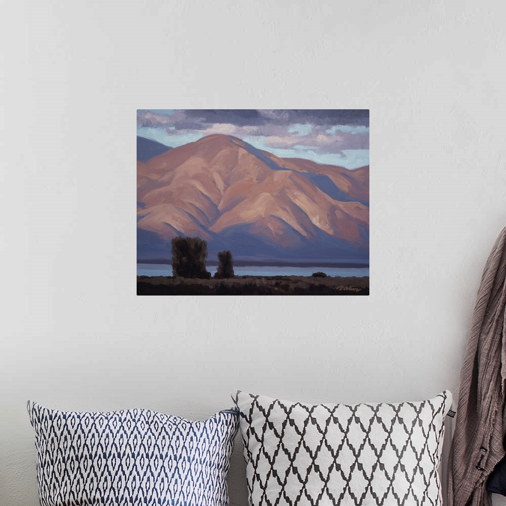 A bohemian room featuring Landscape painting of the Great Salt lake as seen from Farmington bay, Utah.