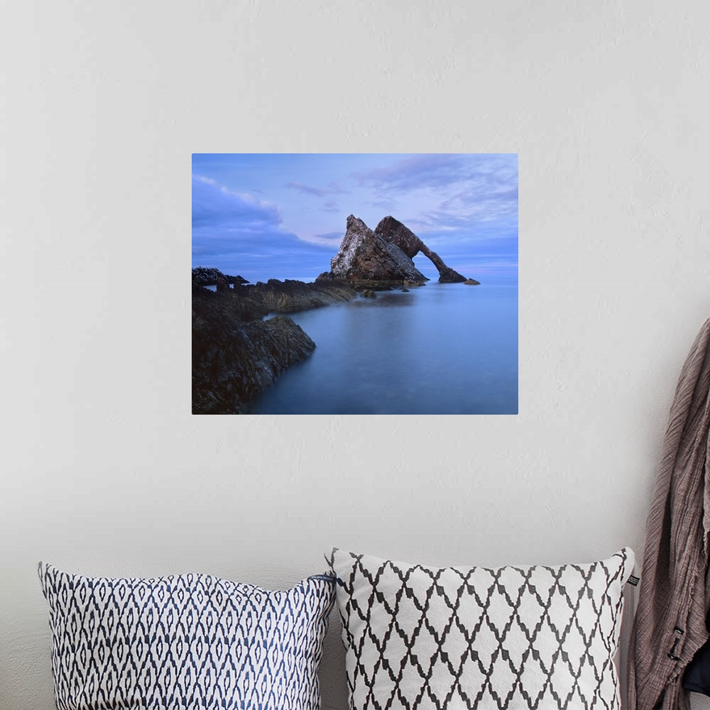 A bohemian room featuring Bowfiddle Rock Arch, spectacular natural arch near Portknockie, Morayshire, Scotland