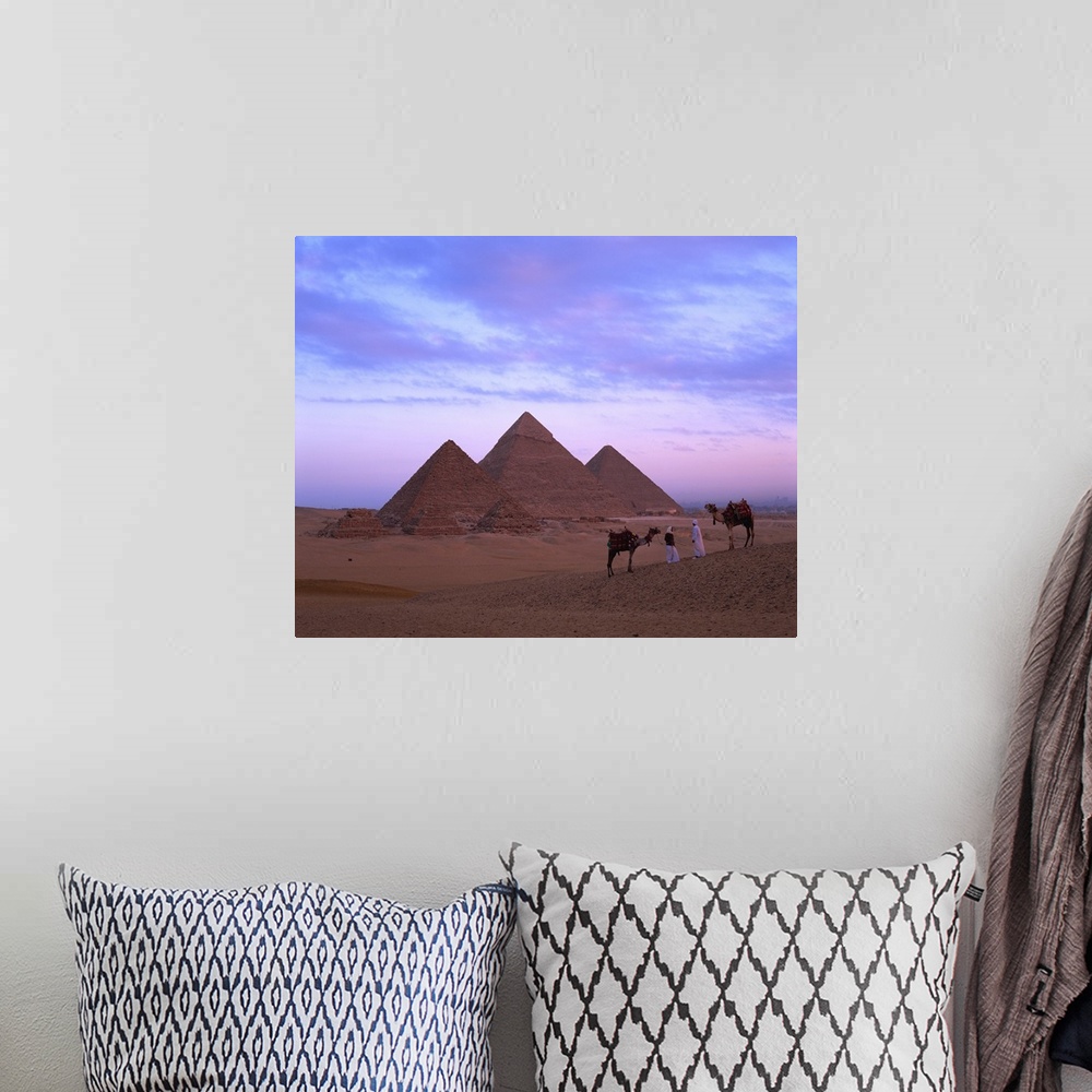 A bohemian room featuring Camel riders at Giza Pyramids, Giza, Cairo, Egypt, Africa