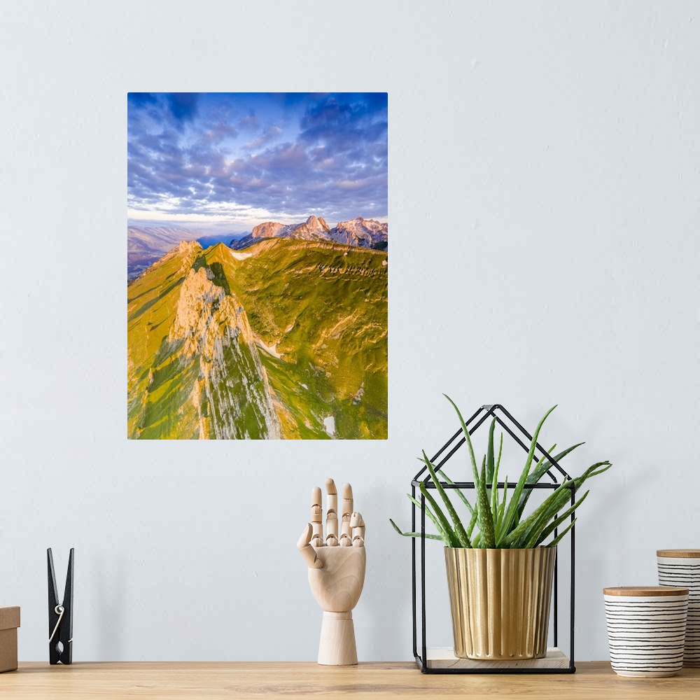 A bohemian room featuring Clouds at dawn over the majestic peaks of Santis and Saxer Lucke, aerial view, Appenzell Canton, ...