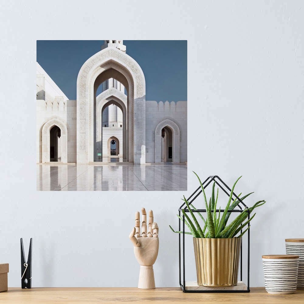A bohemian room featuring Perspective on arches and minaret of Sultan Qaboos Mosque, Muscat, Oman, Middle East