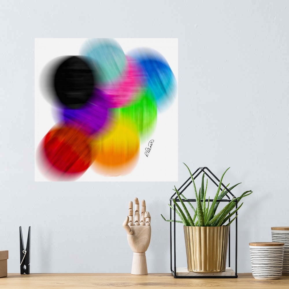 A bohemian room featuring A square image of multi-colored blurred circles on a white backdrop.