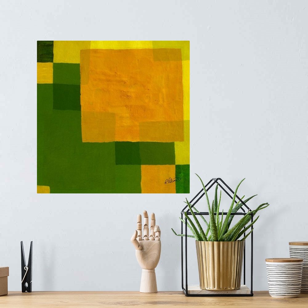 A bohemian room featuring Square abstract painting with layered geometric squares in shades of green and yellow.