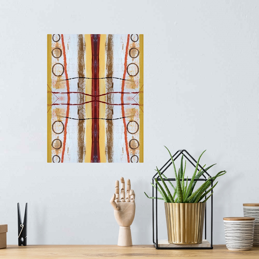 A bohemian room featuring Abstract contemporary painting resembling a kaleidoscopic image, in yellow, orange, and white tones.