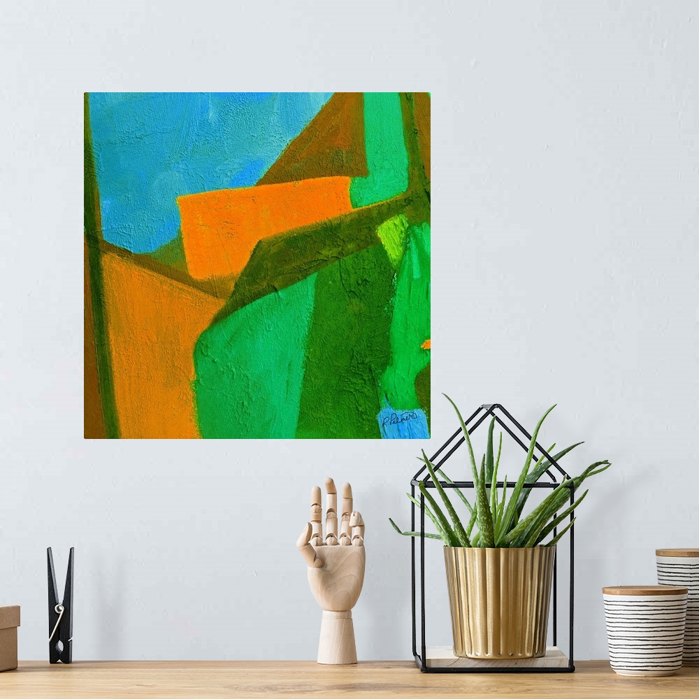 A bohemian room featuring Bright square abstract painting with green, blue, and orange shapes fitting perfectly together wi...