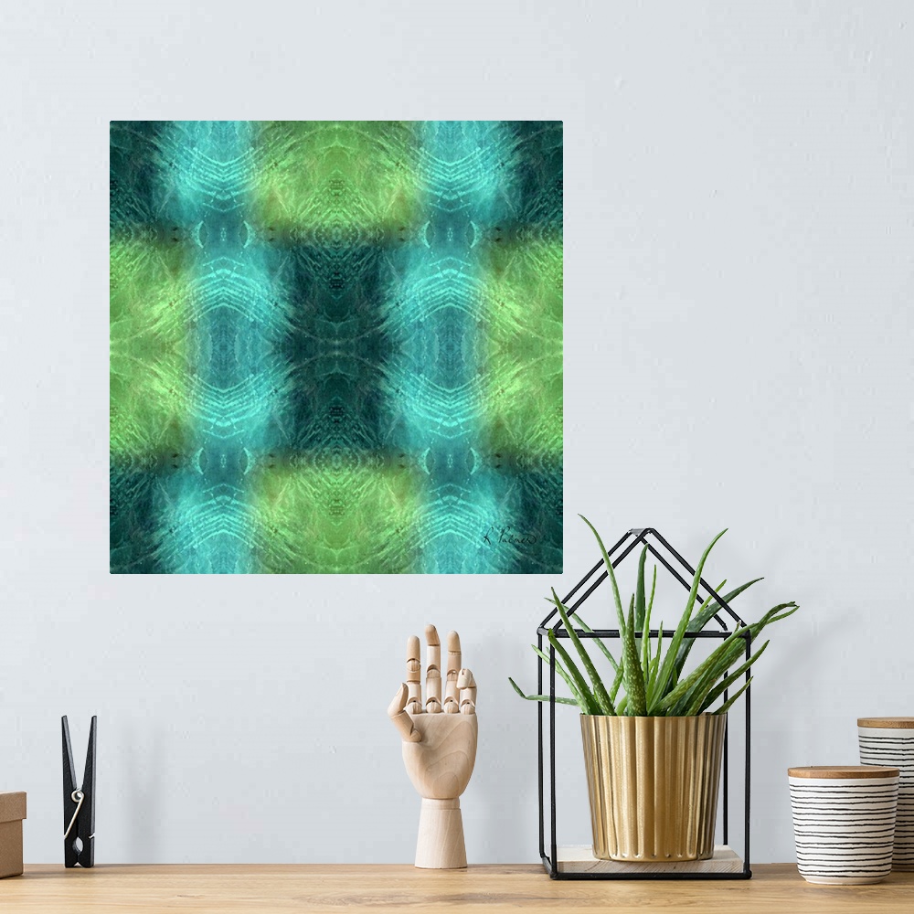 A bohemian room featuring Contemporary abstract painting using blue and green kaleidoscope type images.