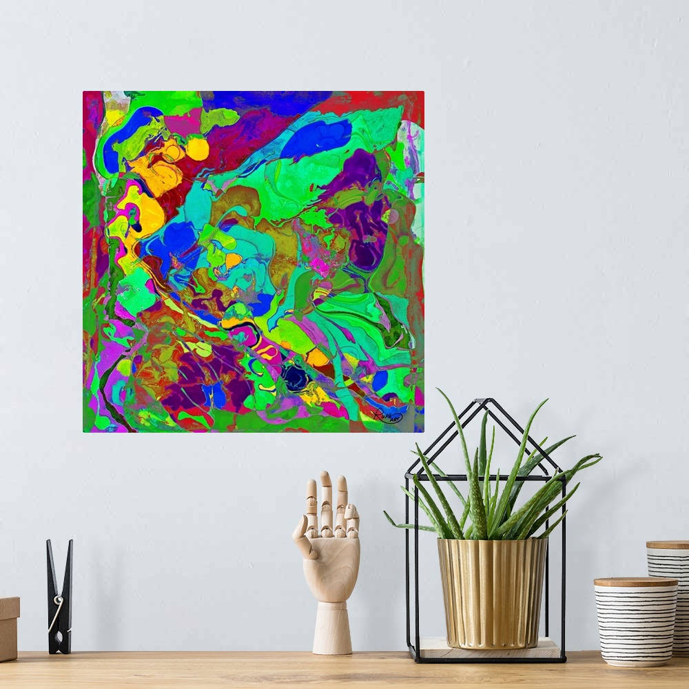 A bohemian room featuring Square abstract art with bright colors swirled and formed together.