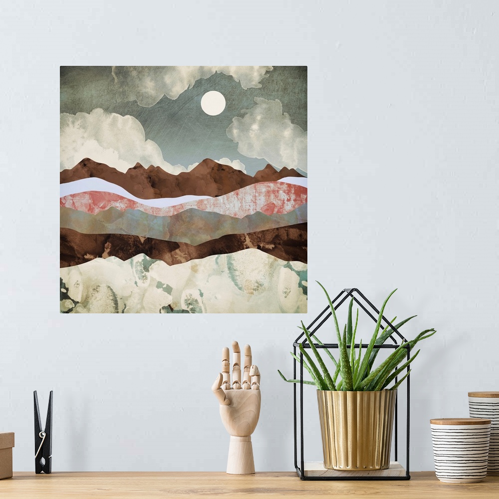 A bohemian room featuring Abstract depiction of a landscape with mountains, clouds, brown and pink.