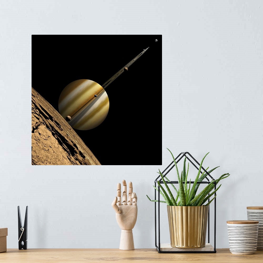 A bohemian room featuring An artist's depiction of a ringed gas giant planet with six moons.