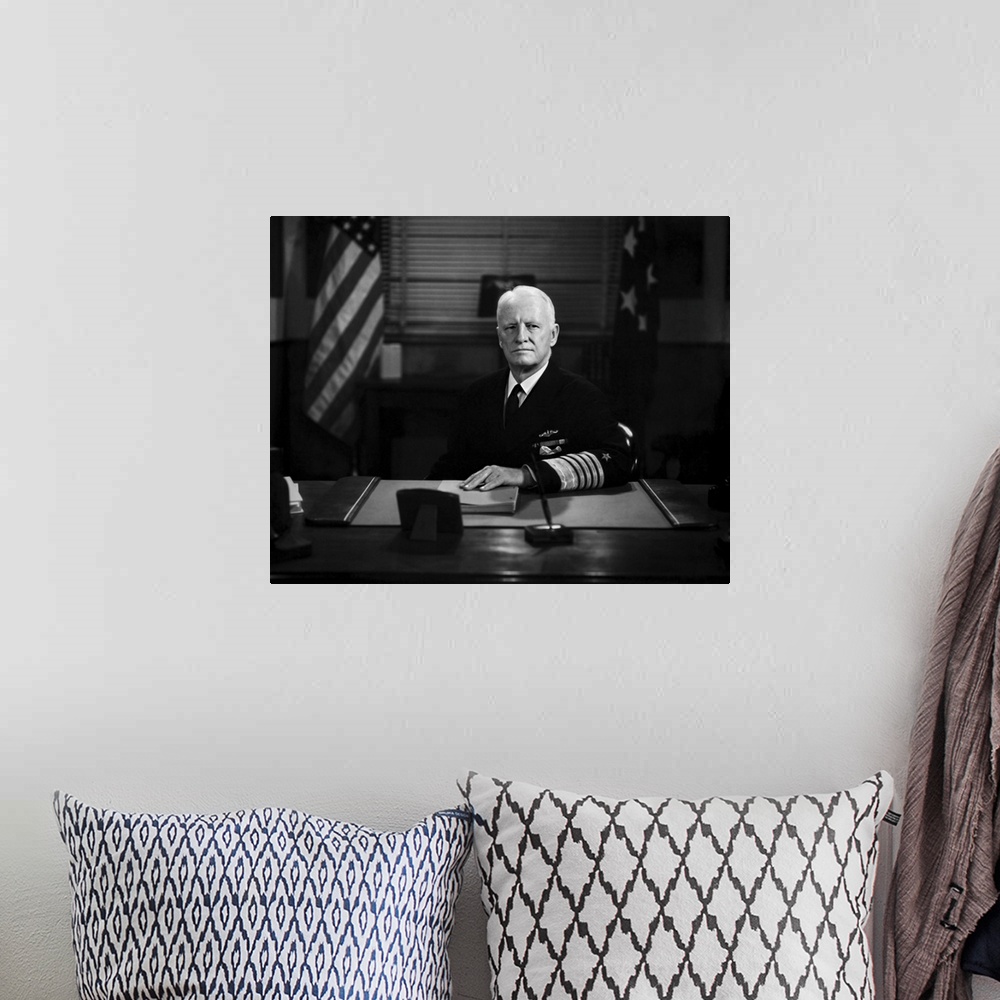 A bohemian room featuring American history photo of Admiral Chester William Nimitz.