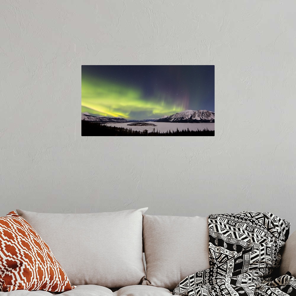 A bohemian room featuring Aurora borealis over Bove Island, Windy Arm, Carcross, Yukon, Canada.