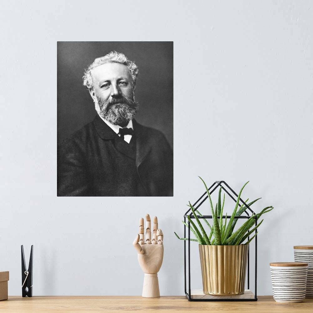 A bohemian room featuring Portrait of French novelist Jules Verne.