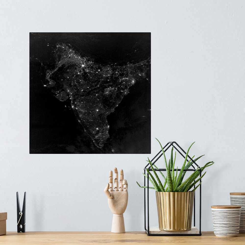 A bohemian room featuring November 12, 2012 - Satellite view of city, village, and highway lights in India.