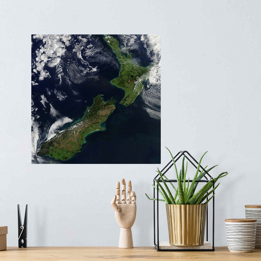 A bohemian room featuring March 30, 2011 - Satellite view of New Zealand. Near the top of the image, snow covers the highes...