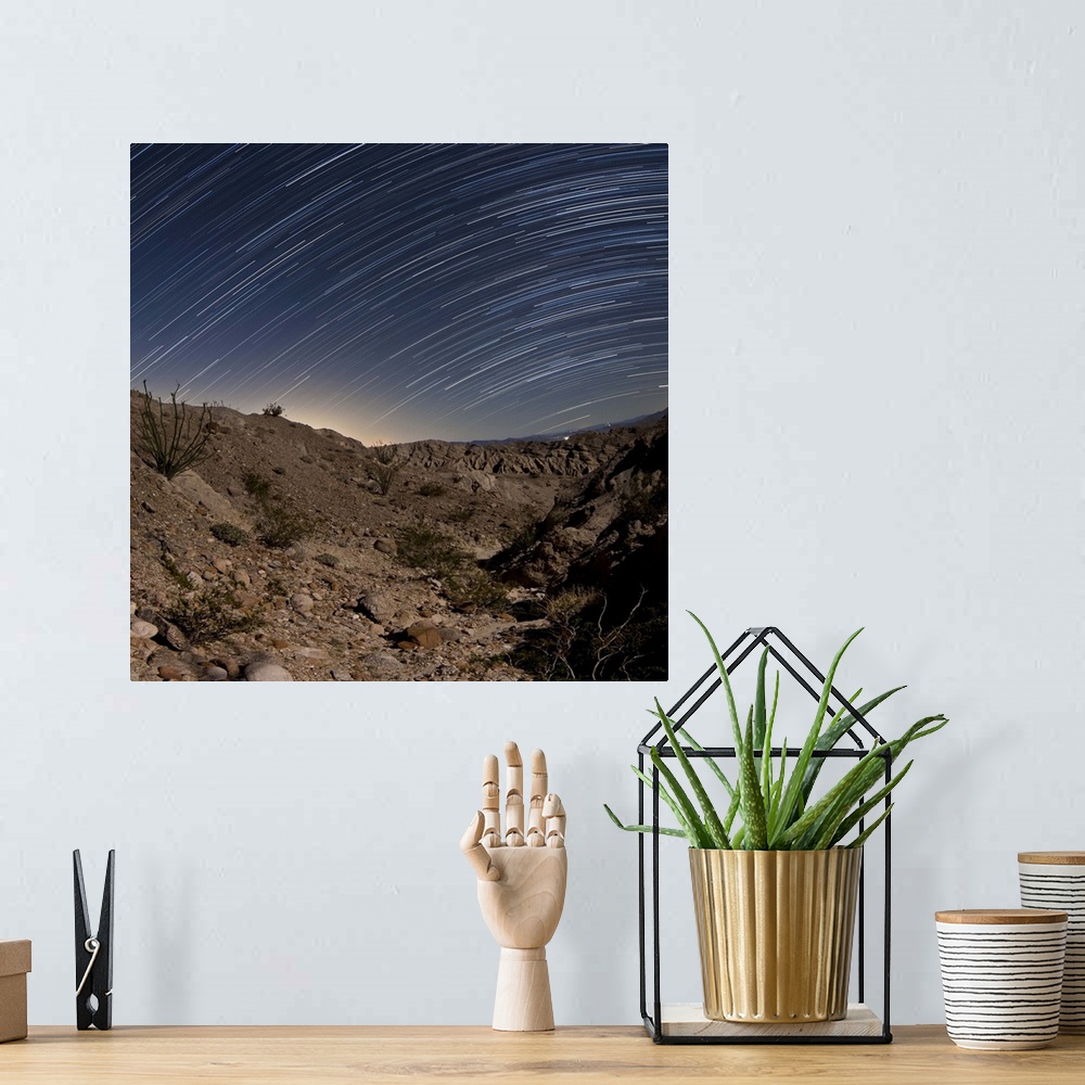 A bohemian room featuring Star trails over one of the many rugged canyons in the Santa Rosa Mountains. Anza Borrego Desert ...