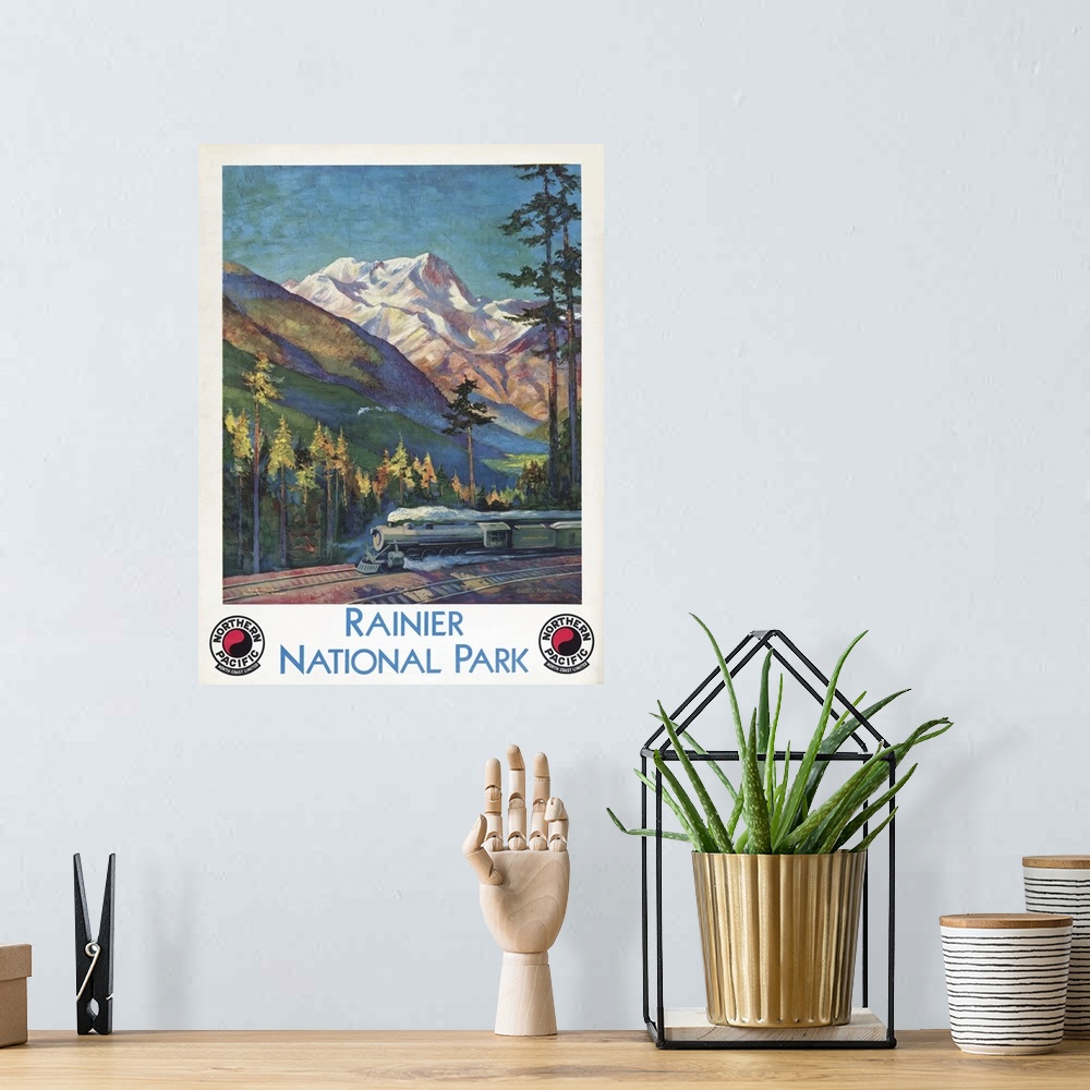 A bohemian room featuring Vintage travel poster for Rainier National Park, Northern Pacific North Coast Limited, 1920