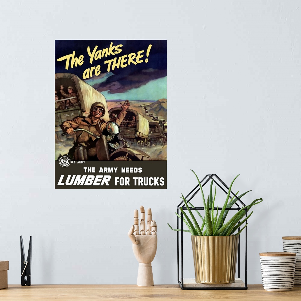 A bohemian room featuring Vintage World War II poster of military transport trucks filled with troops driving down a long r...