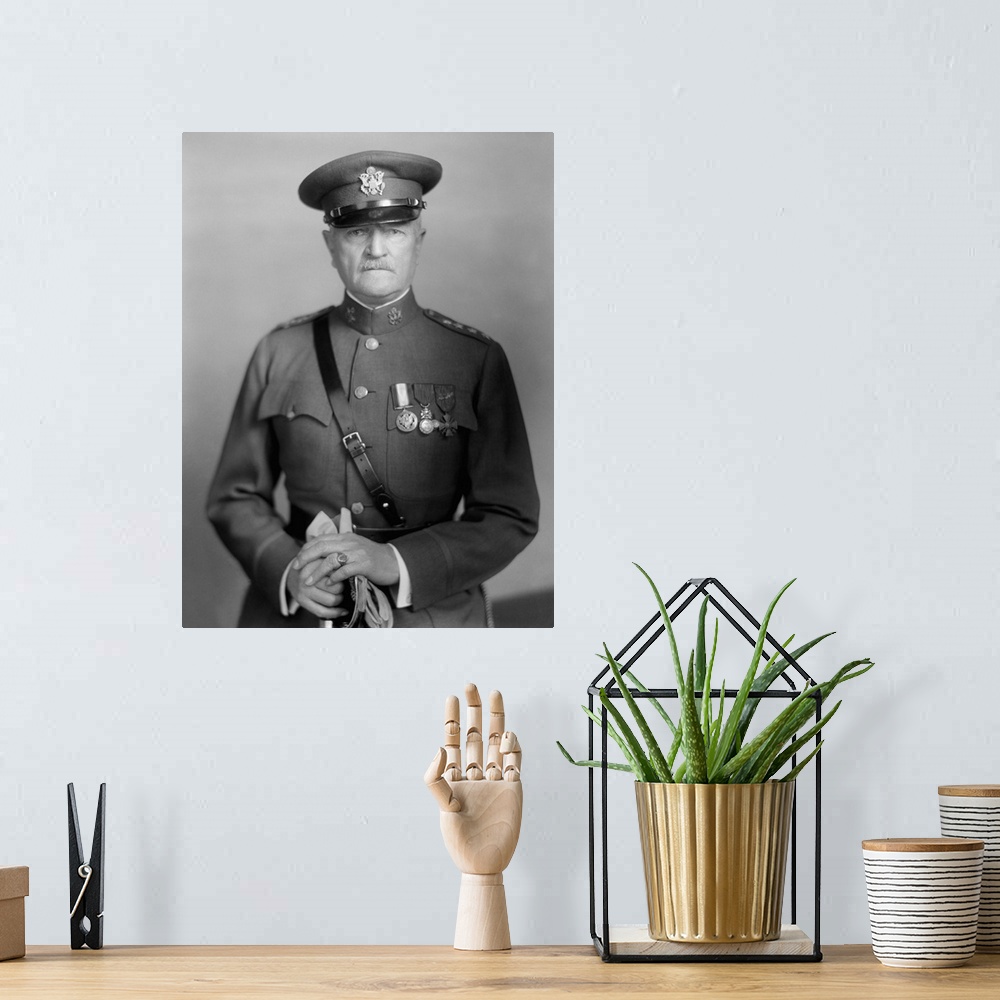 A bohemian room featuring Vintage World War One photo of General John J. Pershing.